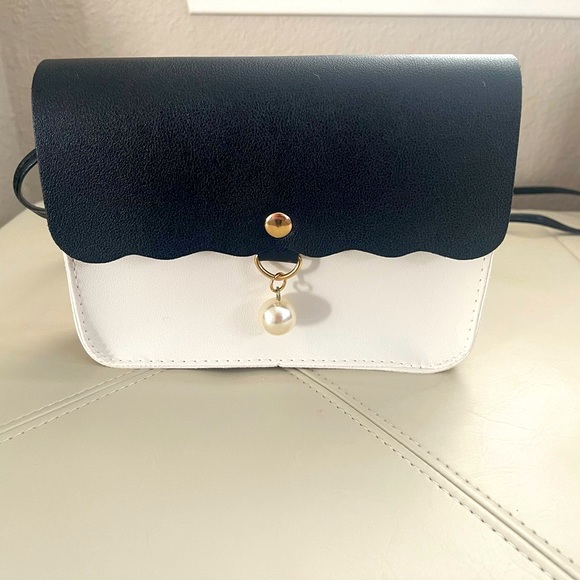 Handbags - Black and White Small Crossbody With Faux Pearl closure.